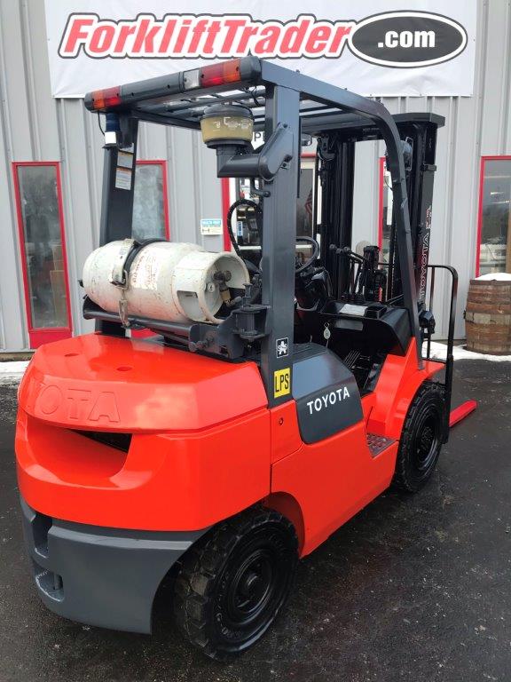 Orange toyota forklift with 5,000lb capacity for sale